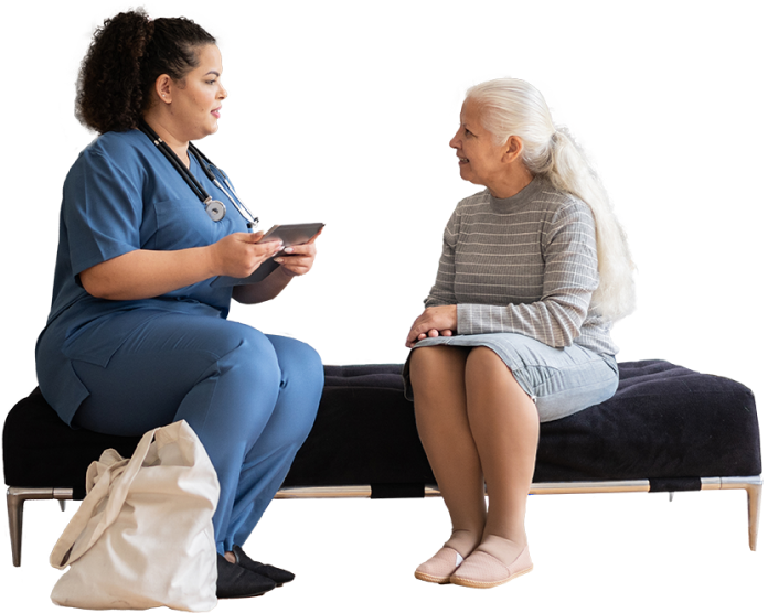 A nurse advising an elderly woman.