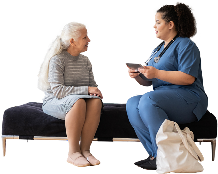A nurse advising an elderly woman.