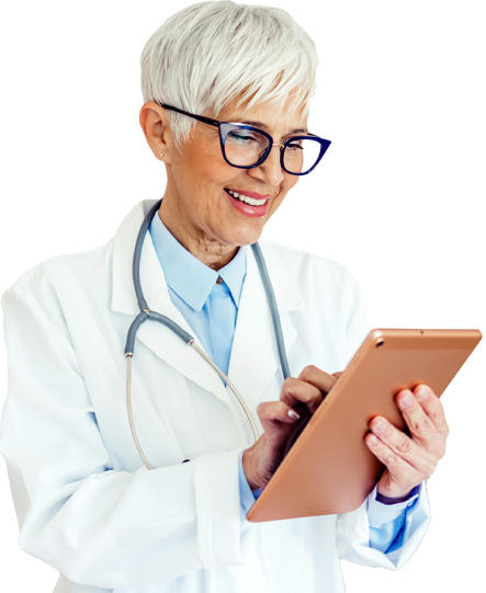 Doctor in a white coat working on a tablet device